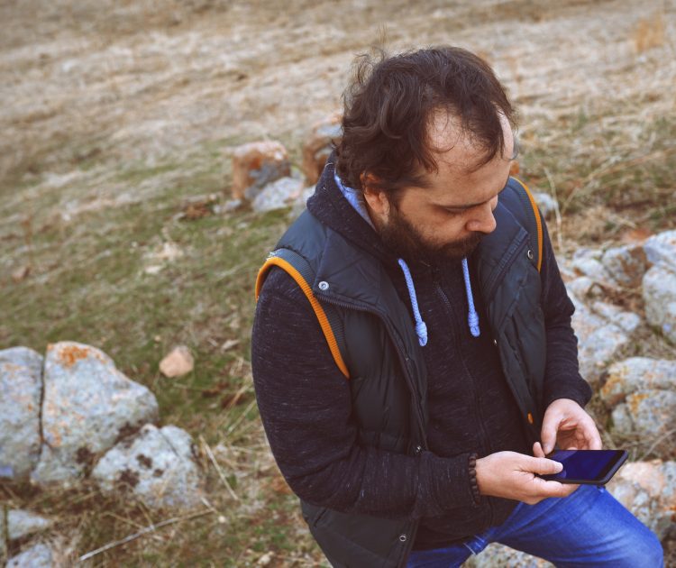 Traveller Using Smartphone GPS